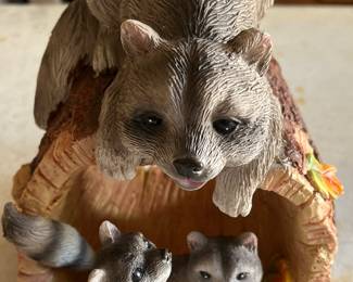 Cute raccoon and babies resin decoration. 