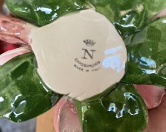 Bottom of Capodimonte rose candle holders. 