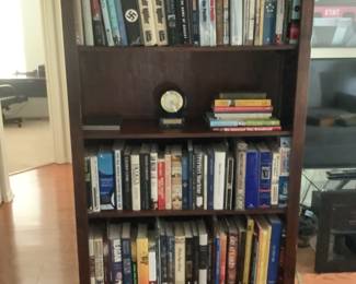 Brown wooden shelf measures 72” h x 15” d x 39” w . Presale $100