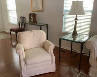 White chair is from Plunkett furniture. Presale $80. Measures 33 h x 33 w x 36” d. End table ( matches 2 other tables) measures 28 x 23 x 23. Presale $95