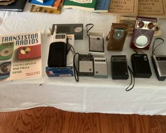 Variety of transistor radios and book