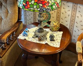 Elegant antique side table, stained glass lamp, decor