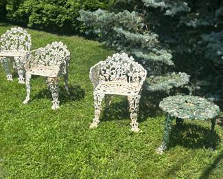 Cute garden wrought iron chairs and tables