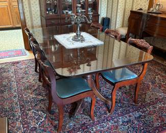 Duncan Phyfe mahogany dining table with 6 chairs and glass table protector