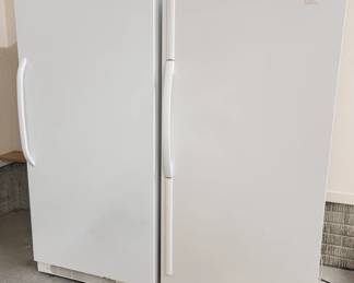 General Electric Upright Freezer (L) and Whirlpool Refrigerator (R)
