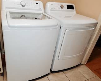 LG 4.5 cu. ft. Top Load Washer and LG 7.3 cu. ft. Electric Dryer