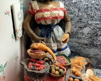 Mexican folk art lady with market wares.