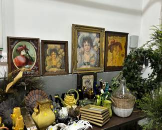 Great pottery throughout this area. Beautiful Victorian prints framed.  Framed Gibson Girl sand Coca Cola Advertising.