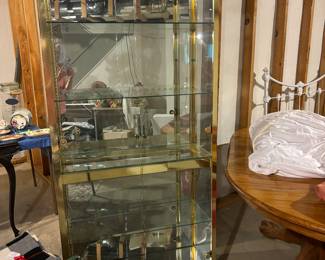 Chromecraft Brass and Glass Curio Cabinet w 4 shelves and 1 mirror shelft. Mirror back and lights. 76" TX32 1/2" w X 13 1/4" Deep