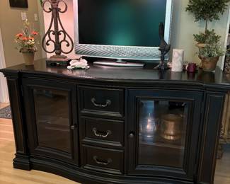 Hooker Furniture Media BlackCabinet/Sideboard with curved glass and 3 drawers. Flex hinges. 64"X24"X33". Beautiful Lamp with pebbled black shade.  32” Sony TV.