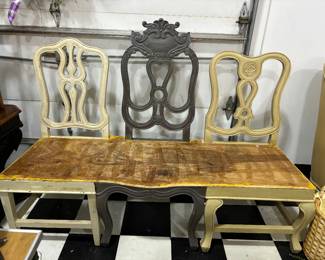 At one time this was a piece of art.  Notice all the styles, Victorian, Chippendale, Hepplewite all connected.  Put a cushion on this and you would have a great conversational piece in your home.