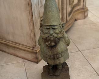 This little Nome  is solid concrete.  A great watchman.  Makes you smile.