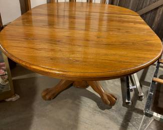 Oak Table 72" Oval with 24" Leaf.  48" wide. Pedestal. Sturdy and in good condition.