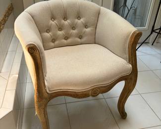 Sweet like tufted arm Chair.  Will fit anywhere