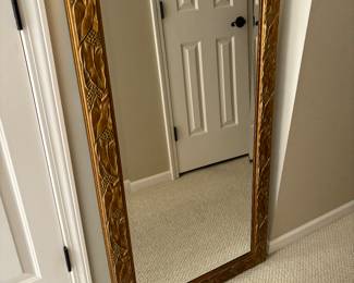 Wonderful Gold Beveled mirror. Frame has subtle grape and leave design