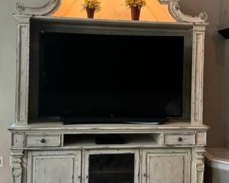 Beautiful Hooker Furniture Co. Media Cabinet/Hutch.  The beautiful lighting is just a gentle touch on the inside of TV portion. Storage and compartments.  Curved 50" Samsung