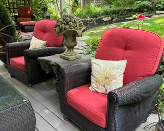 Woven Set that shows wear.  2 chairs, cushions and loveseat sold as a set.  Coffee Table with beveled glass sold separately.