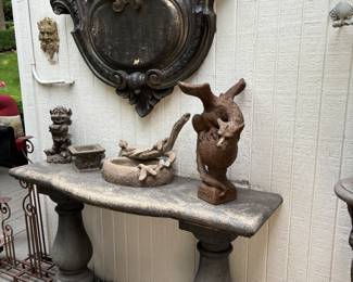 Patio and Deck Decor.  Heavy  Concrete table.  Wall art.  Lifts off of siding.