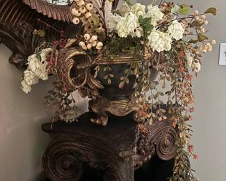 Nice Floral arrangement with bird in grecian style pot on fluer de lis stand. 