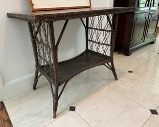 Antique wicker library table