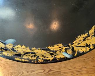 Black gilt decorated tray-style coffee table                      20"h x 31"w x 25.5"d