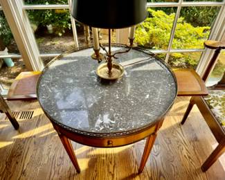 Vintage marble top bouillotte table                                  27.5"h x 28" diameter