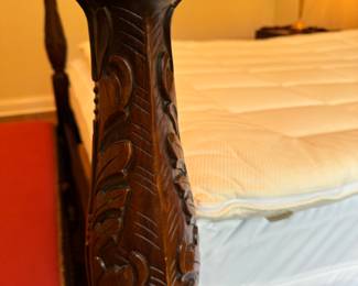 Carved mahogany queen four poster bed