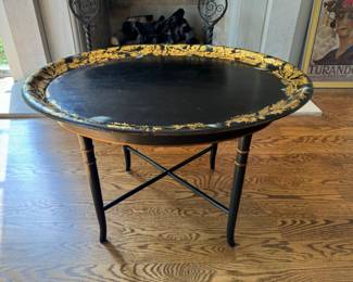 Black gilt decorated tray-style coffee table                      20"h x 31"w x 25.5"d