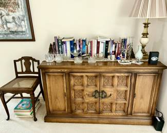 Vintage side chair w/ cane seat, Vintage Buffet, books, lamps, collectible glassware
