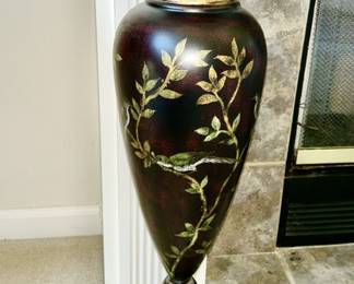 Tall metal vase