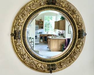 Round decorative wall mirror with beveled glass