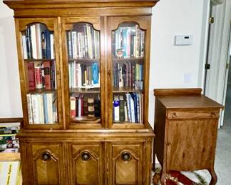 China cabinet, many books, antique music stand