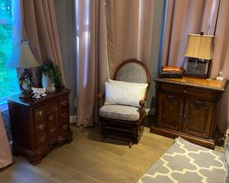 The drapes do not match the floors, but are available for purchase. You'll have to get your own curtain rods, as those stay with the house.