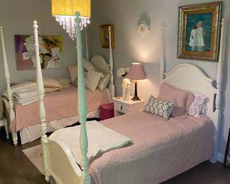 Pretty twin bed pair.