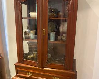 Hutch full of local pottery,