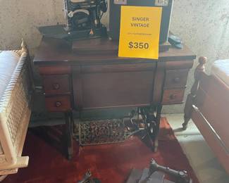 Antique sewing machines.  4 total.