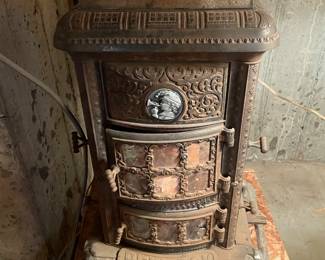 Antique cast iron wood stove.