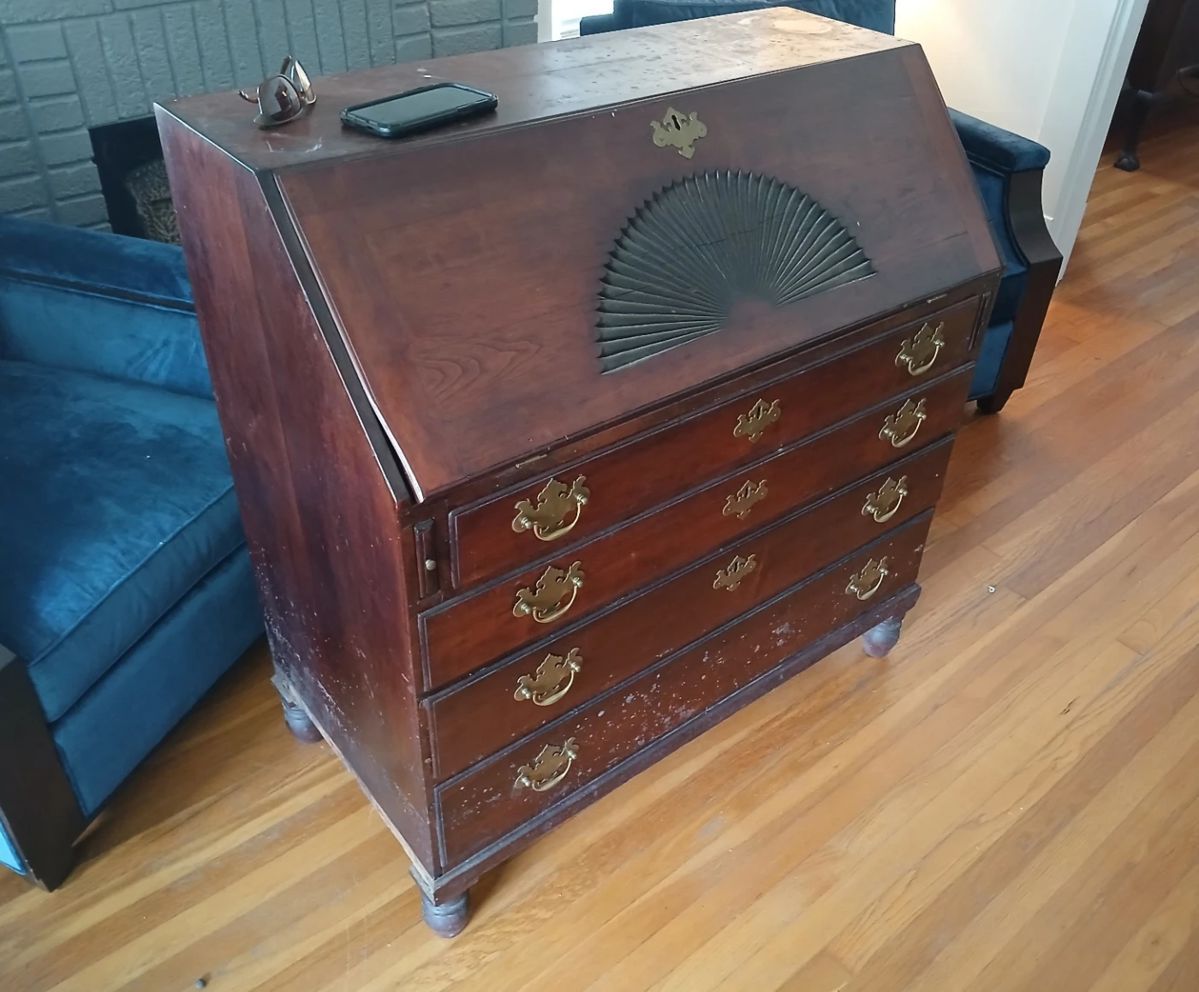 Late 1700’s New England secretary in pristine original condition!  This is, by far, the most significant item in the sale, one of the most significant items we’ve ever seen.  Everything about this piece screams early American craftsmanship, from the hand carved detailing, to the hand cut solid brass hardware.  Even if you don’t have the pockets, you owe it to yourself to come see this incredible piece of history in person.  40x20x41.5  Priced to run out the door to its new home!  $6,000.