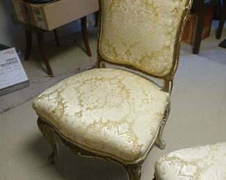 READ CAREFULLY!  This piece is NOT part of the walk-in sale advertised with this listing.  This is a piece I have available at another Midtown Memphis location.  Serious prospective buyers will get a personal viewing any time after the hours of this sale (Fri & Sat after 2:00 and all day Sun.)

Formerly of Riverwood Mansion in Nashville, this wonderful pair of gold leafed French Provincial parlor chairs are perfect for any home decor!  Professionally reupholstered circa 1980, the period appropriate fabric remains in pristine condition.  With a bit of touch up to the gold finish, these lovelies would truly have a commanding presence!  Seat bottoms are 20” square, at 18”.  Backs are 36” overall height.  Sold as pair only.  $220.
