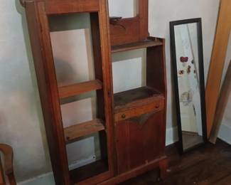 READ CAREFULLY!  This piece is NOT part of the walk-in sale advertised with this listing.  This is a piece I have available at another Midtown Memphis location.  Serious prospective buyers will get a personal viewing any time after the hours of this sale (Fri & Sat after 2:00 and all day Sun.)

This is what we in the business call the makings of a great project piece!  Early 20th century, solid oak, with the beginning signs of art deco. All kinds of potential!  34x10x66.  SOLD AS PROJECT PIECE, AS-IS.  $80.  
