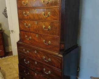 READ CAREFULLY!  This piece is NOT part of the walk-in sale advertised with this listing.  This is a piece I have available at another Midtown Memphis location.  What’s more, my client is out of town this weekend, but serious prospective buyers will get a personal viewing upon her return.
Astonishing antique Georgian chest-on-chest!  Completely handmade from virgin timber, sometime between 1780-1820.  Still completely original (*) and intact, with all of its original solid brass imported hardware!  The sides are solid Walnut, drawer fronts are burled Walnut veneer over a coniferous face piece.  Drawer bottoms are Oak, all other non-exposed solid wood pieces are coniferous.  40x20x79.  $8,000.
(*) The ONLY drawback to this piece is that at some point in its life, someone applied a non-breathable finish coat, which has caused a slight degradation of the burled Walnut veneer.  

