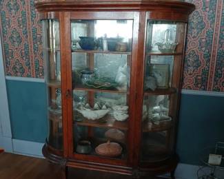 READ CAREFULLY!  This piece is NOT part of the walk-in sale advertised with this listing.  This is a piece I have available at another Midtown Memphis location.  Serious prospective buyers will get a personal viewing any time after the hours of this sale (Fri & Sat after 2:00 and all day Sun.)   Antique bow front display with mercury mirror back!