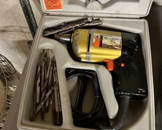 black and decker electric powered drill with bits