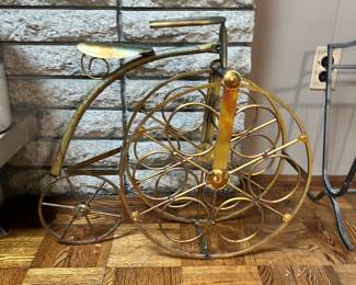 Gold tricycle wine rack
