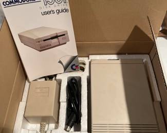 Commodore 1581 3.5 disk drive, new in box. Powers on