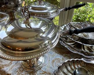 Silver plate chafing dishes, serving pieces and large trays