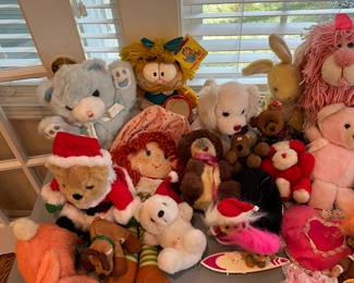 Vintage stuffed animals and dolls