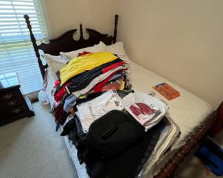 Tons of clothes (bed not for sale)