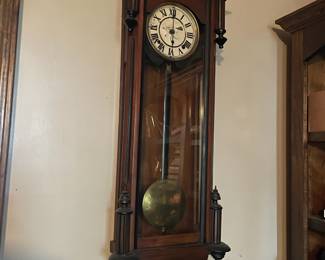 Wall clock with pendulum
