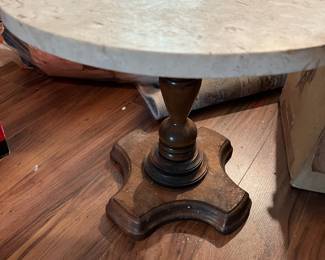 Round marble-topped table